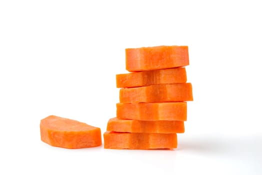 sliced carrots on white background