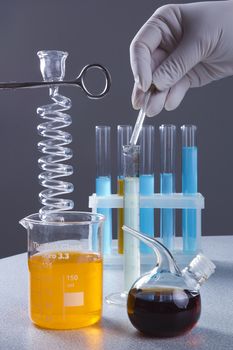 Hands chemist doing research in a laboratory