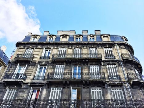 Old residential building in the city of Bordeaux, France.