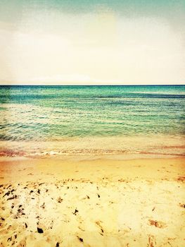 Sea and beach. Vintage style photo with paper texture.