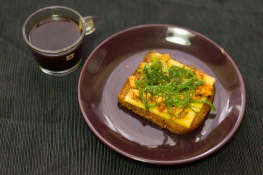 Breakfast of coffee and fragrant toast with stringy cheese