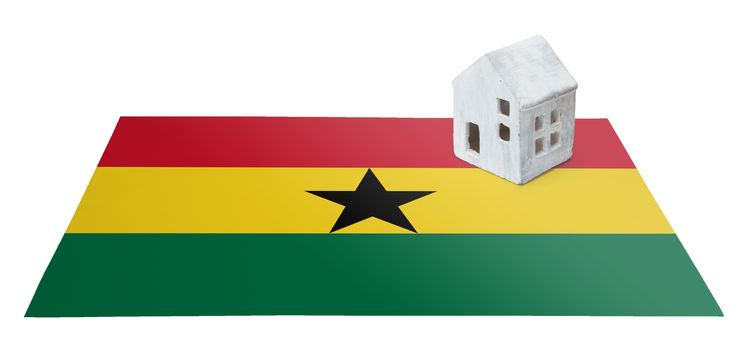 Small house on a flag - Living or migrating to Ghana