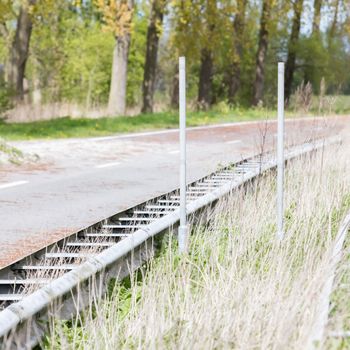 Abandoned road in the Netherlands, not being used for a long time