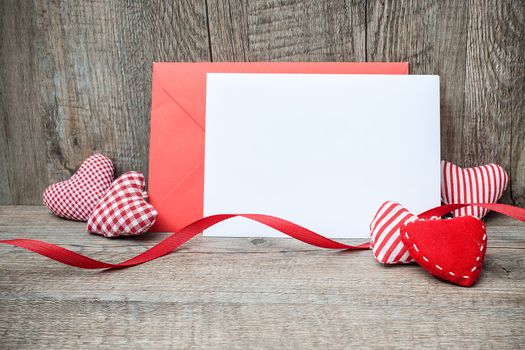 greeting card heart on wooden background