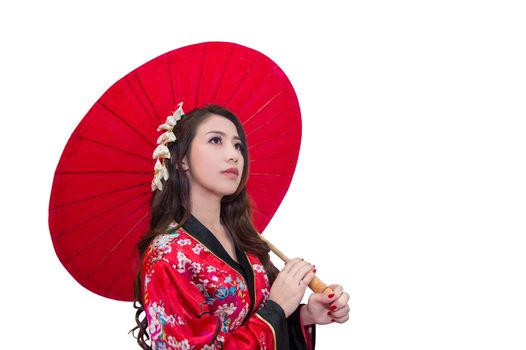 Beautiful young asian woman wearing kimono with red umbrella isolated on white background.