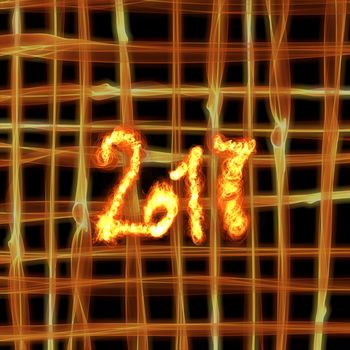 Happy new year 2017 isolated numbers written with fire on bright burning grid bokeh background