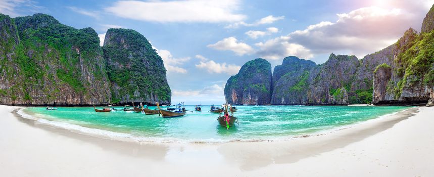 Panorama of Long boat and blue water at Maya bay in Phi Phi Island, Krabi Thailand.