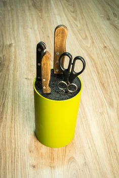 Kitchen knives set in plastic block