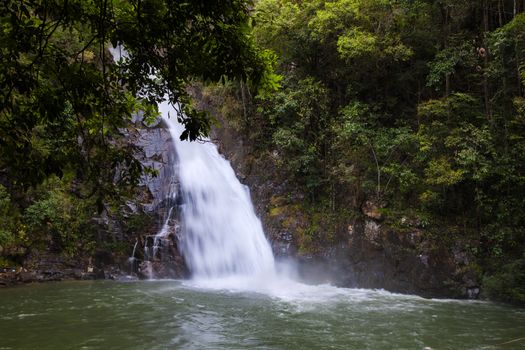 Yong Waterfall National Park is one of the attractions of Nakhon SI thammarat province Thailand. Natural background waterfall. waterfall Colorful leaves. waterfall thailand tropical