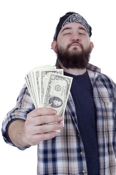 Young bearded man holding money on white background