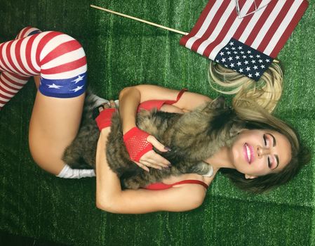 Ana Braga the Brazilian Playmate celebrates Memorial Day with a sexy Patriotic social media shoot, which her pet cat interrupts, Los Angeles, CA 05-24-17