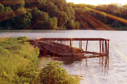 Magic pond. Composition of a pond and rays. Natural background
