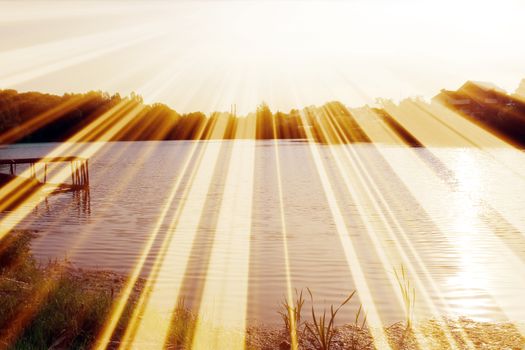 Magic pond. Composition of a pond and rays. Natural background