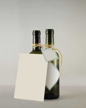 two bottles of wine with greeting card