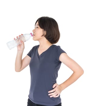 Young asian woman drinking bottled water isolated on white background