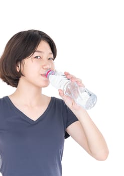Young asian woman drinking bottled water isolated on white background