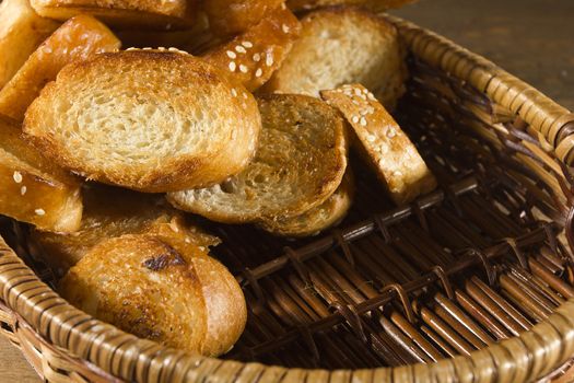 Grilled slices of French bread in a wicker basket