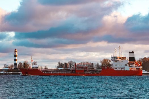 Red cargo oil tanker moving to Baltic sea