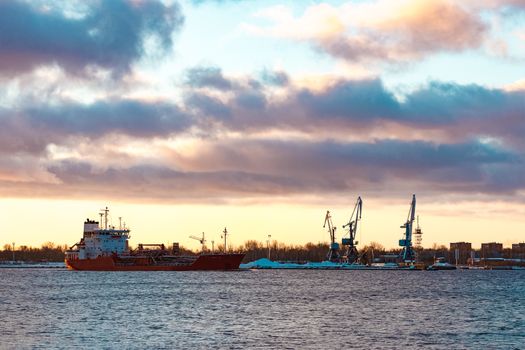 Red cargo oil tanker moving to Baltic sea