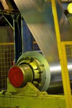 Rolls of metal sheet inside of steel plant