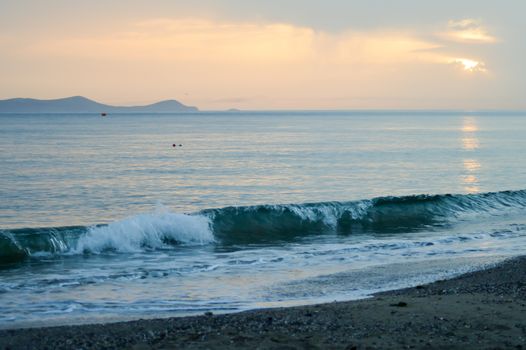 Sunrise over the ocean at Amoudara beach in northern Crete