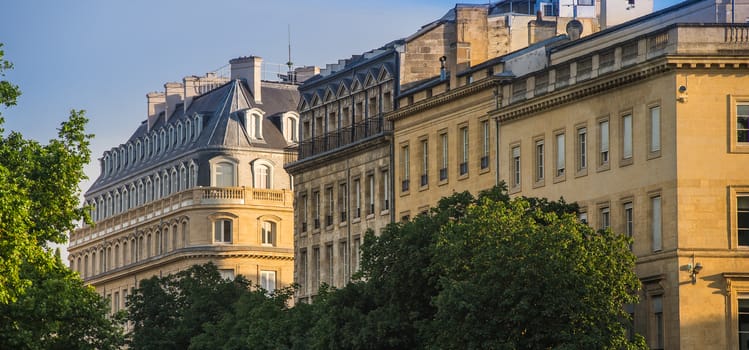 Typical Bordeaux architecture in the centre of Bordeaux, France. Decorative appartment building on spring day.