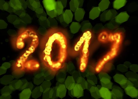 Happy new year 2017 isolated numbers written with flame fire sparkle light on black blurred bokeh background frame.