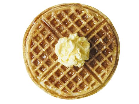 close up of traditional classic belgium american waffle with butter and maple syrup