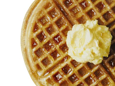 close up of traditional classic belgium american waffle with butter and maple syrup