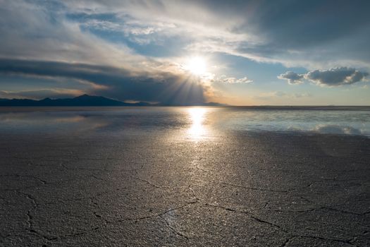 Sunset in Salar de Uyuni salt flats desert, Andes Altiplano, Bolivia