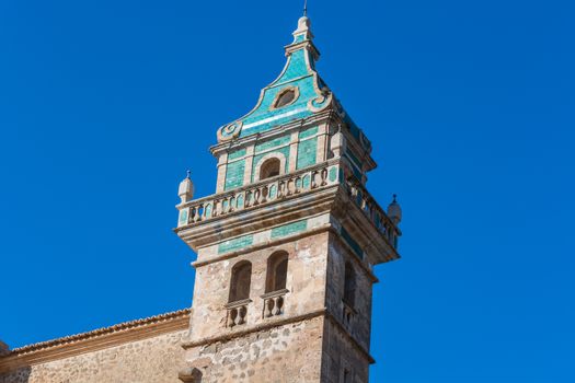 Beautiful view. Tower of the monastery in Valldemossa. Close to the Sierra de Tramuntana.
