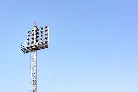 Stadium lights with sky for background