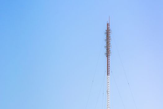 Telecommunication antenna tower, Radio antenna tower, Cellular antenna tower in blue sky background