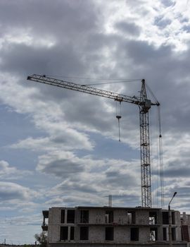 Industrial landscape, construction of high-rise buildings and cranes
