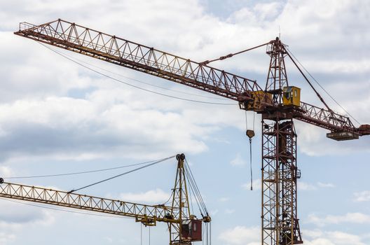 Industrial landscape, construction of high-rise buildings and cranes