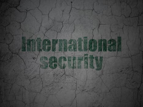 Protection concept: Green International Security on grunge textured concrete wall background