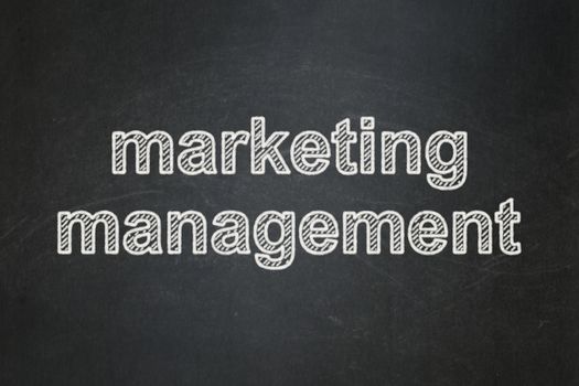 Marketing concept: text Marketing Management on Black chalkboard background