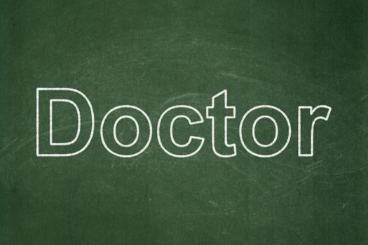 Medicine concept: text Doctor on Green chalkboard background