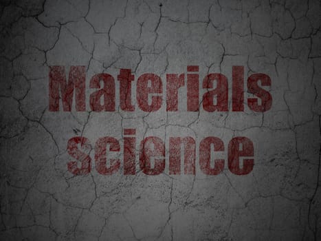 Science concept: Red Materials Science on grunge textured concrete wall background