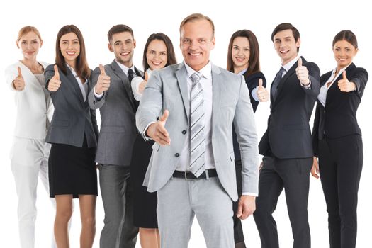 Happy business team with thumbs up isolated on white background