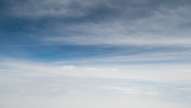 The beautiful cloudy and blue sky (view from airplane).