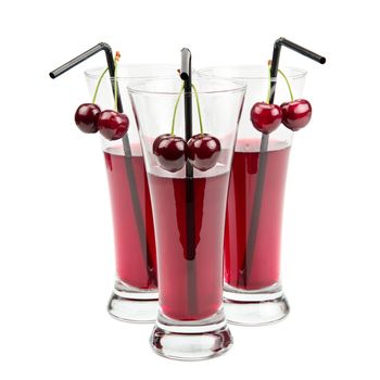 glasses of cherry juice isolated on white background