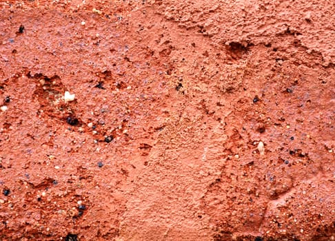 Surface of red brick in close-up as a texture