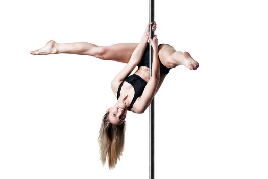 pole dance girl exercising and posing against white background