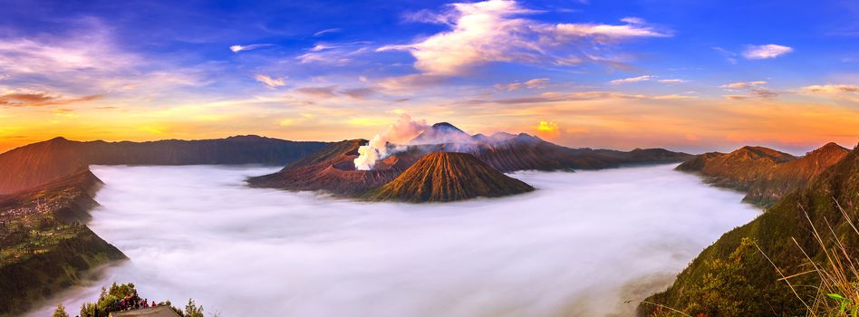 Mount Bromo volcano (Gunung Bromo) during sunrise from viewpoint on Mount Penanjakan in Bromo Tengger Semeru National Park, East Java, Indonesia.