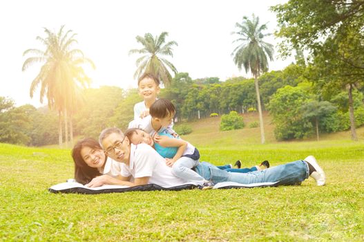 asian family having fun time at outdoor