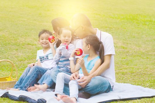 asian family having fun time at outdoor