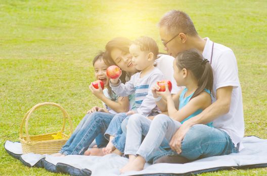 asian family having fun time at outdoor