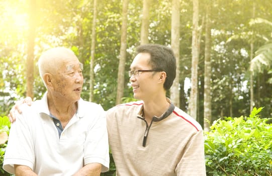 Conversation between the senior men and son.