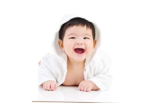 beautiful asian baby girl crawling on the floor